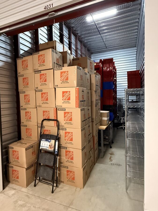 Storage unit stacked neatly with moving boxes